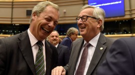 European Commission President Jean-Claude Juncker welcomes Nigel Farage, the leader of the United Kingdom Independence Party, prior to a plenary session at the European Parliament on the outcome of the "Brexit" in Brussels, Belgium, June 28, 201