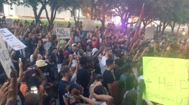 Marchers protest against police shootings of two black men in Louisiana and Minnesota during a demonstration in Dallas, Texas, U.S. July 7, 2016. © Dallas Police Department / Reuters