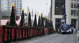 Workers place concrete barriers outside the Christmas market at Breitscheid square in Berlin, Germany, December 22, 2016, following an attack by a truck which ploughed through a crowd at the market on Monday night. © Hannibal Hanschke / Reuters