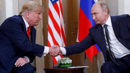 U.S. President Donald Trump and Russian President Vladimir Putin shake hands at the beginning of a meeting at the Presidential Palace in Helsinki, Finland, July 16, 2018. (Pablo Martinez Monsivais/The Associated Press)
