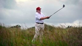 Call it the Trump Paradox: with so much scandal it is becoming easier for the non-obsessives to tune it all out. (Andy Buchanan/AFP/Getty Images)