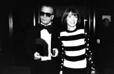 Lagerfeld wears a tuxedo with a large bow tie, accompanied by Vogue publisher, Anna Wintour, at the 12th annual Council of Fashion Designers of America Awards ceremony in New York in 1993. Credit: Robin Platzer/The LIFE Images Collection