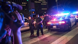 Police seen near barricades following the sniper shooting in Dallas July 7. (Laura Buckman/AFP/Getty)