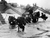 Royal Marine Commandos going ashore on D-Day in Normandy, where the weather was far from ideal (Picture: PA).