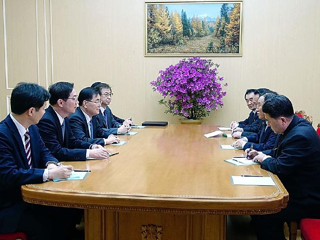 North and South Korean leaders come together in their first talks since 2011. Picture: South Korean Presidential Blue House via Getty Images.Source:Getty Images