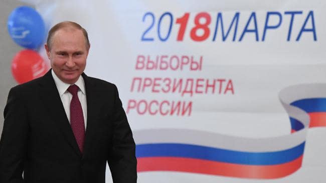 Vladimir Putin votes at a polling station during Russia's presidential election in Moscow. Picture: AFP/Yuri KadobnovSource:AFP