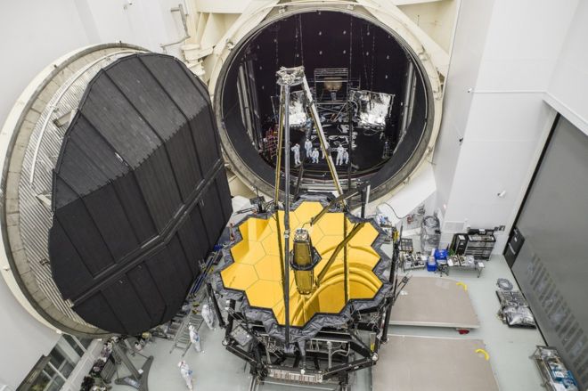 NASA/CHRIS GUNN Image caption The part of JWST that holds the mirrors and instruments recently passed its last big space simulation