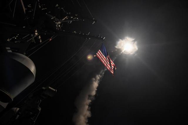 U.S. Navy guided-missile destroyer USS Porter conducts strike operations from the Mediterranean Sea against Al-Shayrat air base in Homs, Syria, April 7, 2017. Russia disputed the claim that it was informed ahead of time and has threatened to destroy U.S.