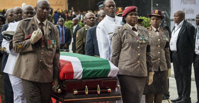 © Wikus De Wet, AFP | Members of the South African military carry the coffin of anti-Apartheid icon Winnie Madikizela Mandela during her funeral in Johannesburg, on April 14, 2018