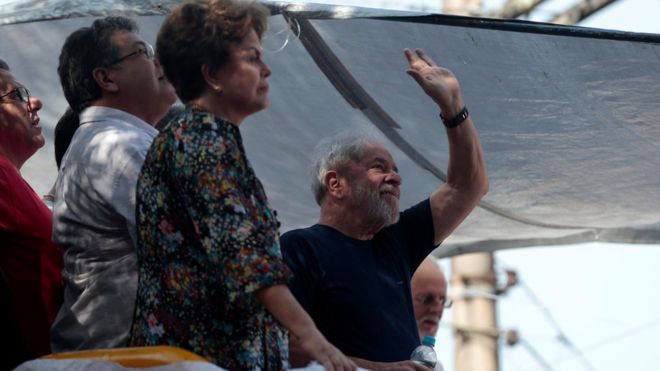 REUTERS / Dilma Rousseff (foreground) was at the side of Lula, seen here waving