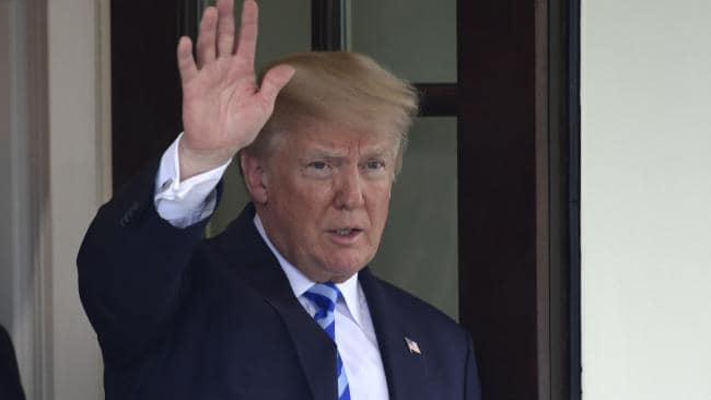 President Donald Trump waves to Uzbek President Shavkat Mirziyoyev as he leaves following a visit to the White House in Washington, Wednesday, May 16, 2018. (AP Photo/Susan Walsh)Source:AP