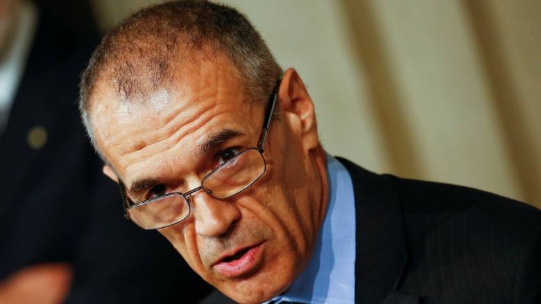 Former senior International Monetary Fund (IMF) official Carlo Cottarelli speaks to the media after a meeting with Italy's President Sergio Mattarella at the Quirinal Palace in Rome. Cottarelli will try to obtain the confidence of parliament,
