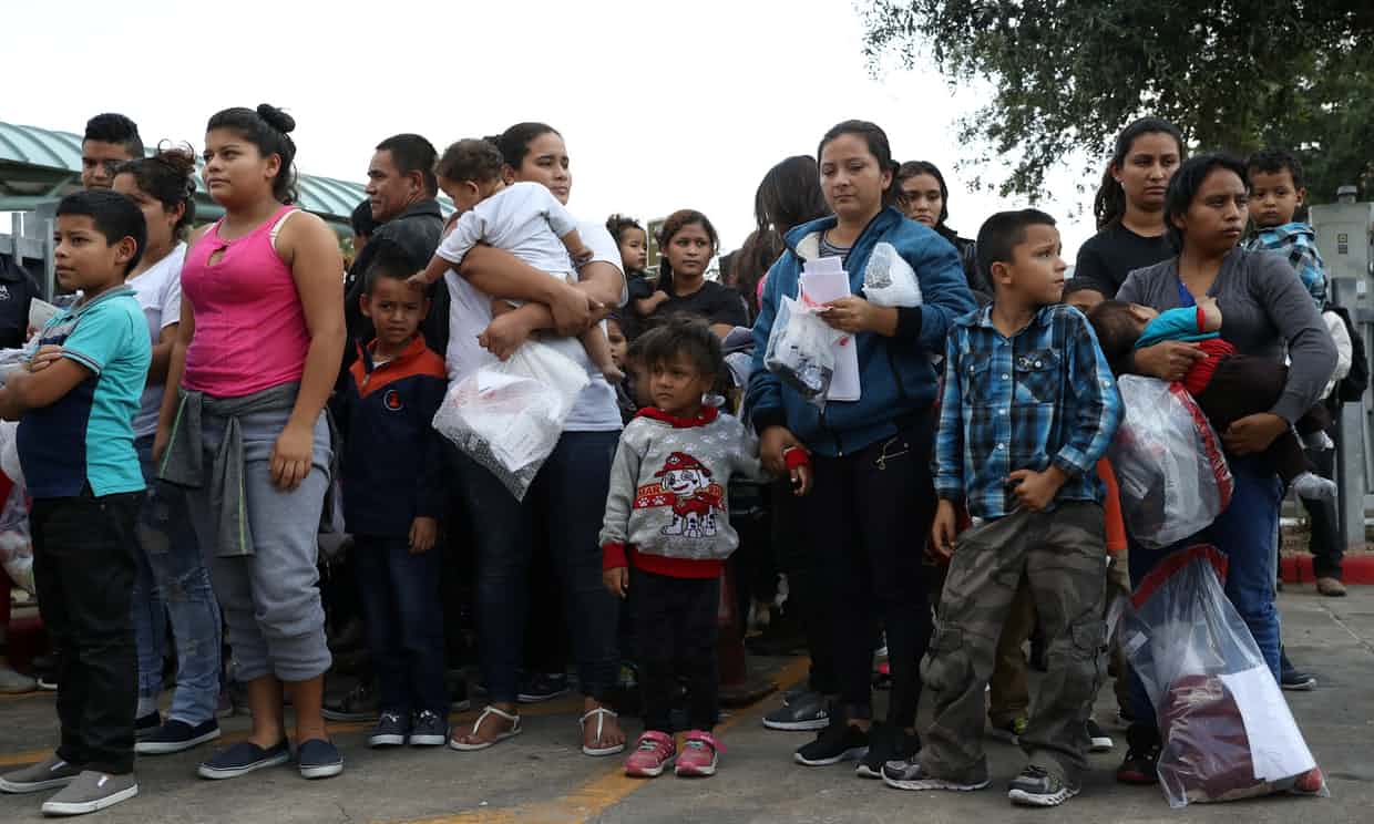 Undocumented immigrant families are released from detention at a bus depot in McAllen, Texas, on Monday. Photograph: Loren Elliott/Reuters