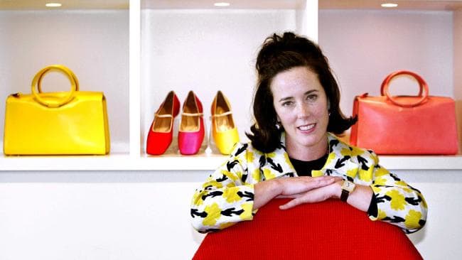 Designer Kate Spade poses with handbags and shoes from her 2004 collection in New York. Picture: APSource:AP