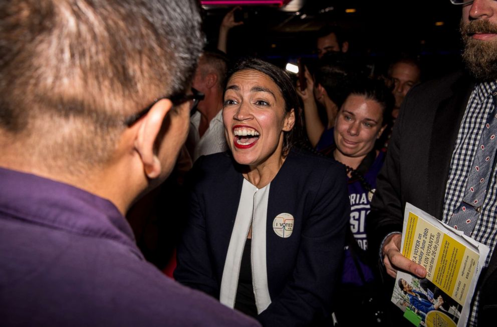 Progressive challenger Alexandria Ocasio-Cortez celebrates with supporters at a victory party in the Bronx after upsetting incumbent Democratic Representative Joseph Crowly on June 26, 2018 in New York.