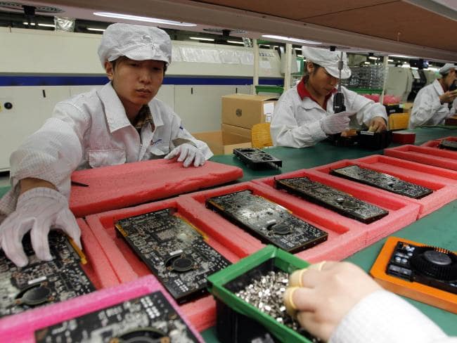 A damning report has revealed that Foxconn workers, who manufacture products for Amazon, were subject to terrible working conditions. Picture: APSource:AP
