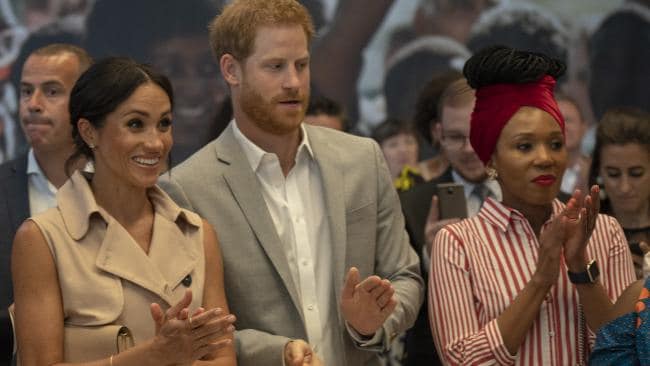 Prince Harry, Meghan Markle and Zamaswazi Dlamini-Mandela at an exhibition dedicated to Nelson Mandela in London. Picture: Getty ImagesSource:Getty Images