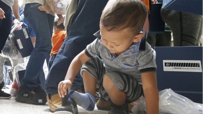 EPA / A young migrant child waiting to be processed in Texas after the government's suspended zero-tolerance policy