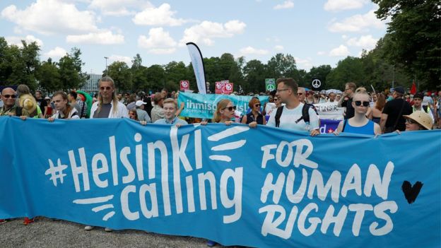 REUTERS / Protesters in Finland have been urging Mr Trump to focus on human rights ahead of his visit.