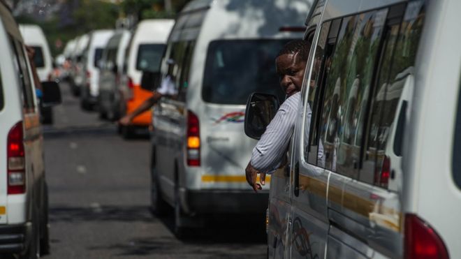 AFP/GETTY / Minibus taxis are the most popular form of transport in South Africa