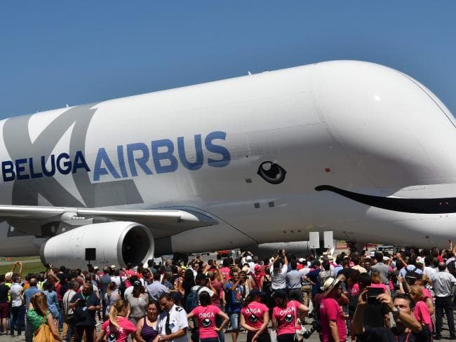 The Beluga XL aircraft taxis in front of Airbus employees at Toulouse-Blagnac. Picture: AFPSource:AFP