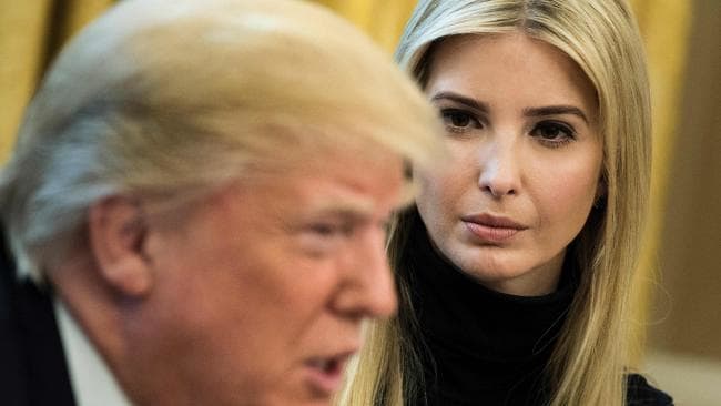 Ivanka Trump listening to her father US President Donald Trump. Picture: AFPSource:AFP