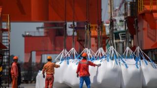 GETTY IMAGES / Bags of imported chemicals at a port in Zhangjiagang in China