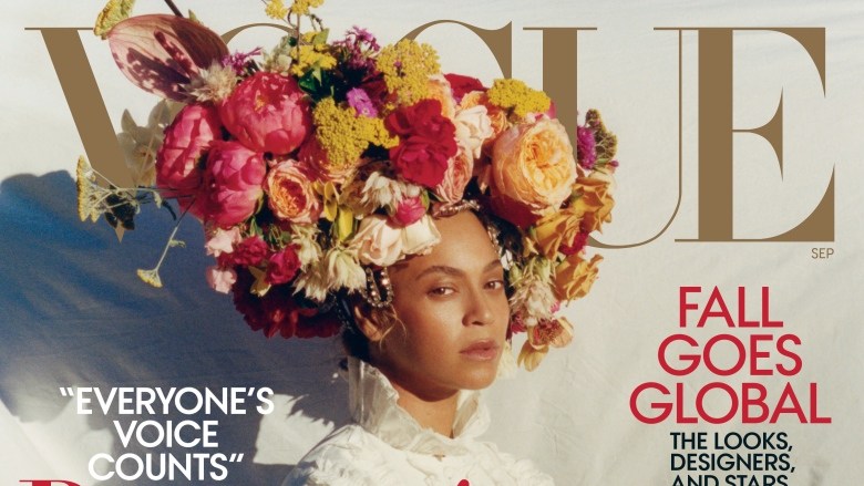 The September cover of Vogue shows the singer-songwriter in very little makeup, wearing a white Gucci dress and a giant floral headdress. (Tyler Mitchell/Vogue)
