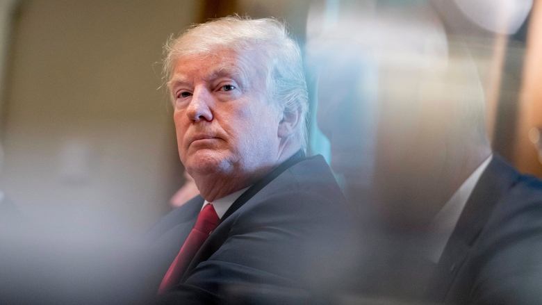 U.S. President Donald Trump, seen at a cabinet meeting Thursday in Washington, blasted the New York Times Sunday in a series of tweets, criticizing a story suggesting White House attorney Don McGahn had been co-operating extensively with the investigation