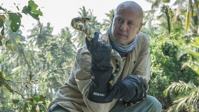 Associate Professor Bryan Fry with a snake.Source:Supplied