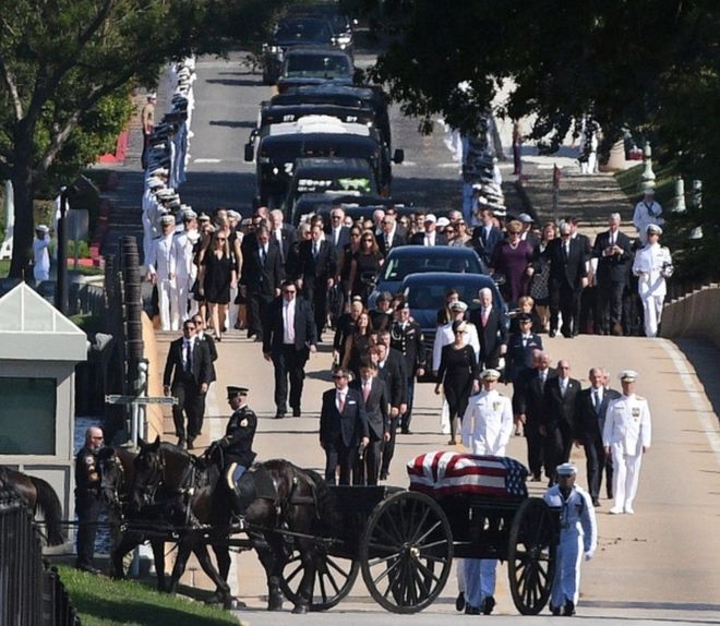 REUTERS / John McCain's funeral procession heads to the cemetery at the US Naval Academy