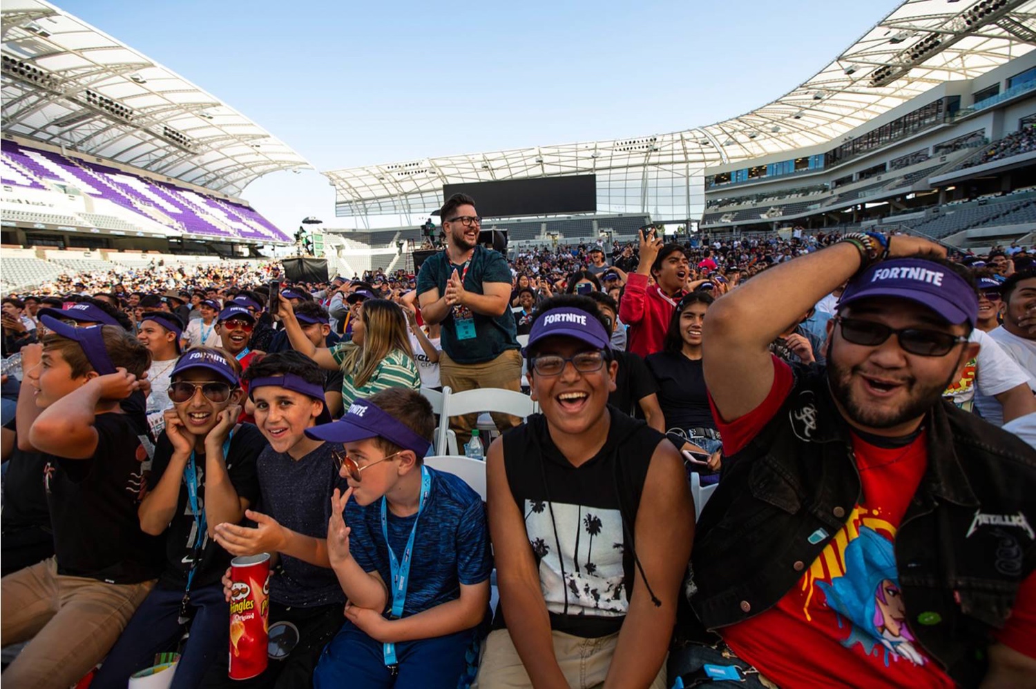 Gamers cheer during the Epic Games Fortnite E3 tournament in Los Angeles on June 12