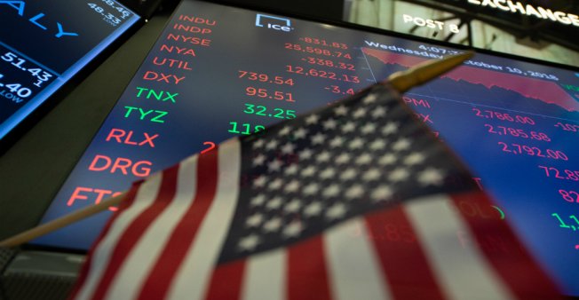 Global markets tumble as Trump slams 'crazy' Fed