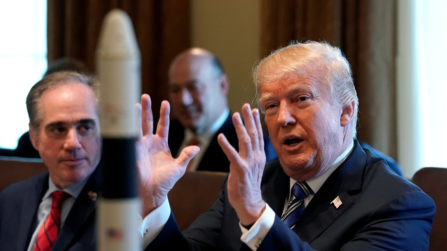 FILE PHOTO: With a rocket ship on the table, US President Donald Trump speaks at the White House © Reuters / Kevin Lamarque