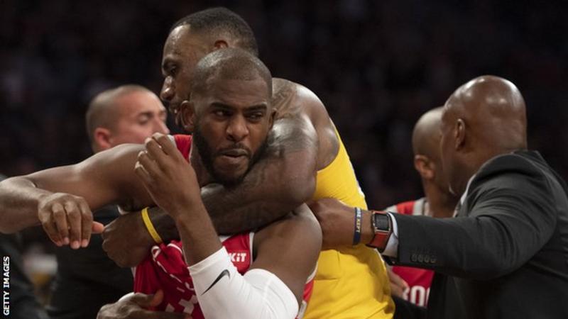 LeBron James (in yellow) joined the LA Lakers in the summer after leading the Cleveland Cavaliers to four straight NBA finals