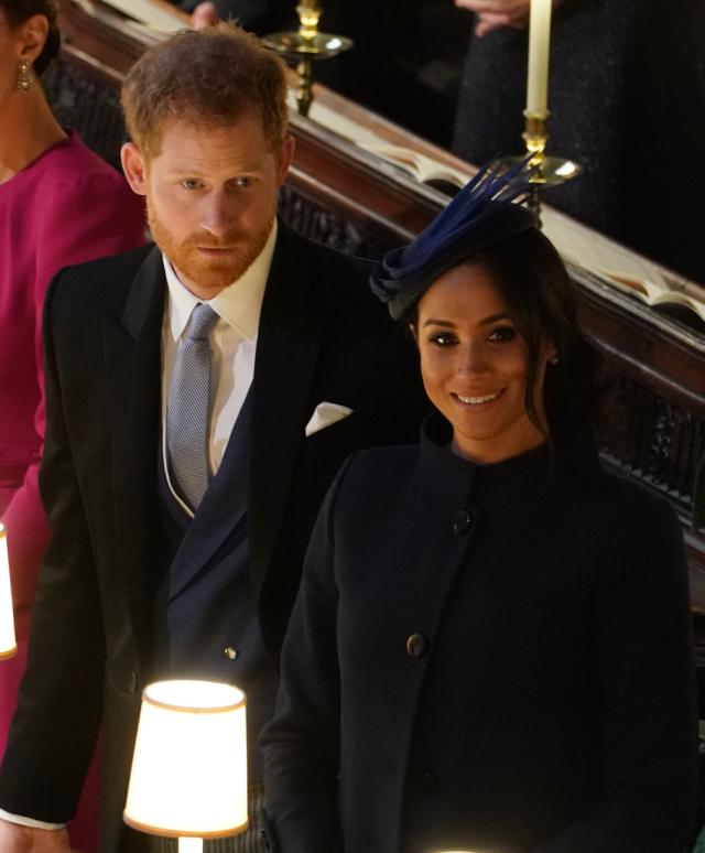 Meghan’s Givenchy look at Princess Eugenie’s wedding sparked pregnancy rumors. (Photo: Owen Humphreys/WPA Pool/Getty Images)