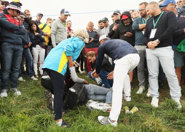 Brooks Koepka went to check on a woman who was hit in the eye by a stray shot at the Ryder Cup. (Photo: Getty Images).