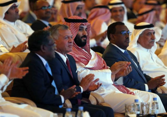 FILE - In this Tuesday, Oct. 23, 2018 file photo, Saudi Crown Prince, Mohammed bin Salman, center, Jordan&#39;s King Abdullah II second left, and Ethiopia&#39;s Deputy Prime Minister Demeke Mekonnen, second right, attend the Future Inves