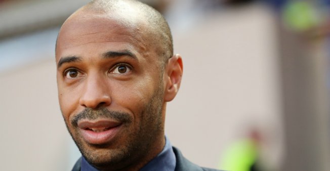 © Valery Hache, AFP | Thierry Henry looks on prior to the UEFA Champions League first round football match between AS Monaco and Atletico Madrid at the Stade Louis II, in Monaco, on September 18, 2018