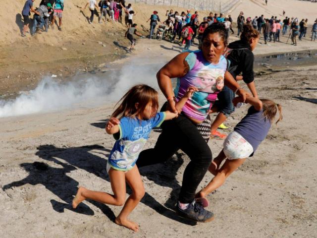 Trump threatens to close Mexico border 'permanently' after US police fire tear gas at migrant caravan