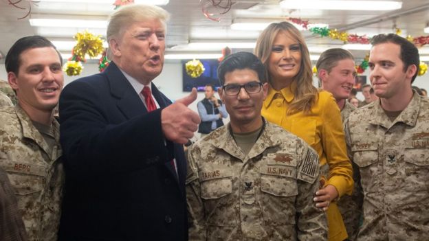 AFP / President Trump and his wife met military personnel at the al-Asad airbase, west of Baghdad