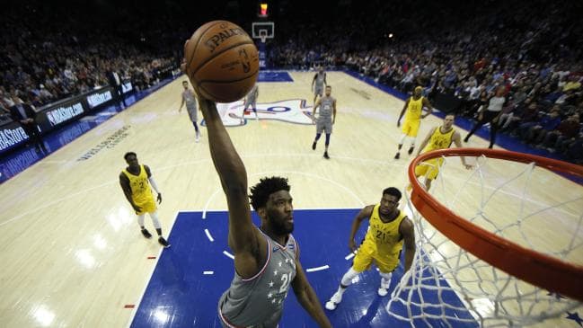 Philadelphia 76ers' Joel Embiid goes up for a dunk during his huge first half.Source:AP