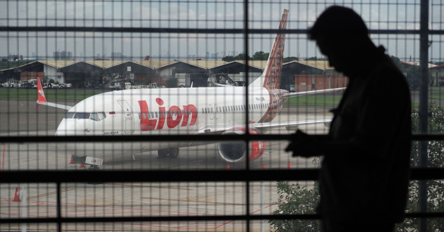 Dimas Ardian | Bloomberg | Getty Images / A Batik Air Boeing Co. 737 Max 8 aircraft, operated by Lion Air, center, sits on the tarmac at Soekarno-Hatta International Airport in Cenkareng, Indonesia, on Tuesday, March 12, 2019.