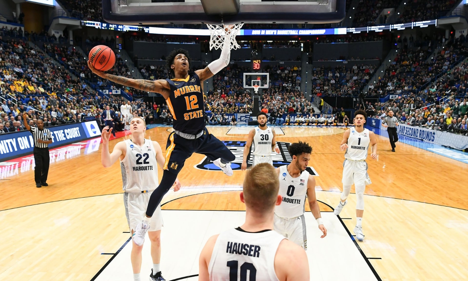 Ja Morant recorded the ninth triple-double in NCAA tournament history in Murray State’s upset of Marquette. Photograph: Robert Deutsch/USA Today Sports