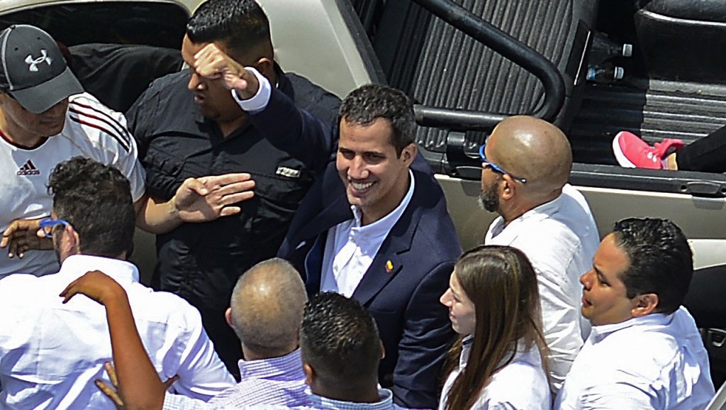 Matias Delacroix, AFP | Venezuelan opposition leader and self-proclaimed acting president Juan Guaido is greeted by supporters upon his arrival in Caracas on March 4, 2019.