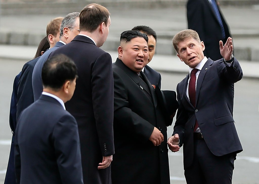 North Korea’s leader, Kim Jong-un, center, speaking with Oleg Kozhemyako, the governor of the Russian region of Primorsky Krai, after arriving in Vladivostok, Russia, Wednesday.CreditCreditIgor Novikov/Press Office of the Primorye Territory Adminis