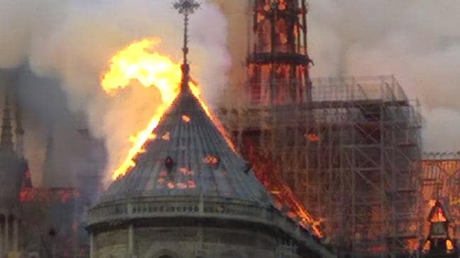 The spire and parts of Notre Dame cathedral burning. Picture: Dominique Bichon/APSource:AP