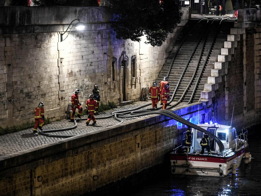 The French president warned the battle is not won at Notre Dame and could continue for days. Picture: Philippe WojazerSource:AP