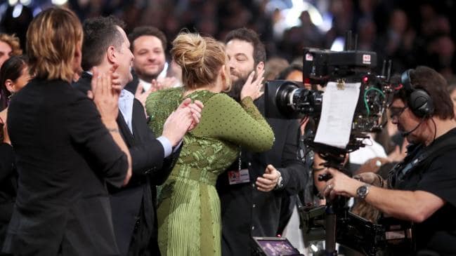 Adele and Simon kiss at the 2017 Grammys. Picture: Christopher Polk/Getty Images for NARASSource:Getty Images