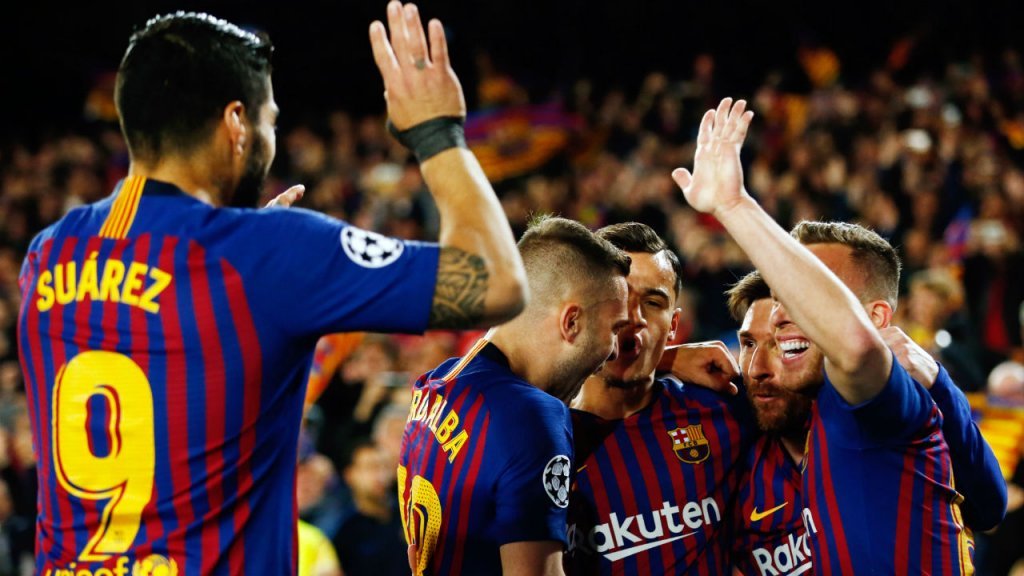 Pau Barrena / AFP | Barcelona players celebrate during their 3-0 win over Manchester United at the Camp Nou on Tuesday night.